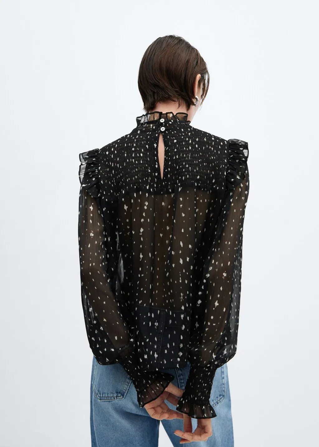 Blusa stampata volant