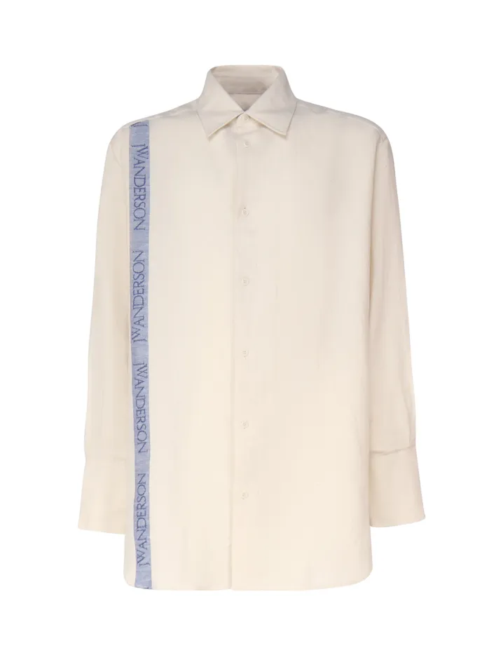 CAMICIA CON SPALLE BASSE