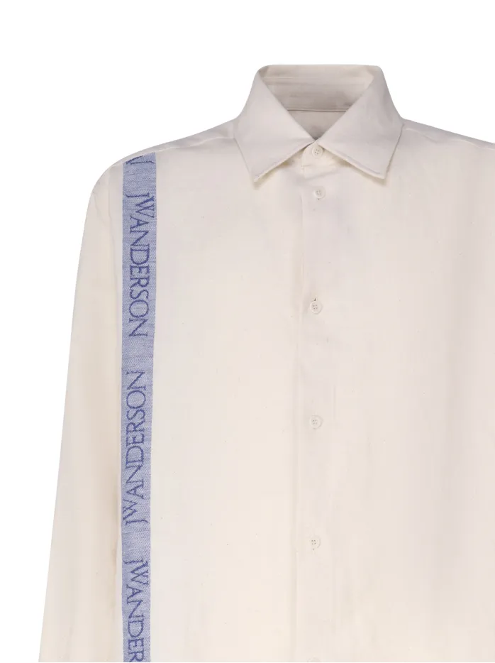 CAMICIA CON SPALLE BASSE