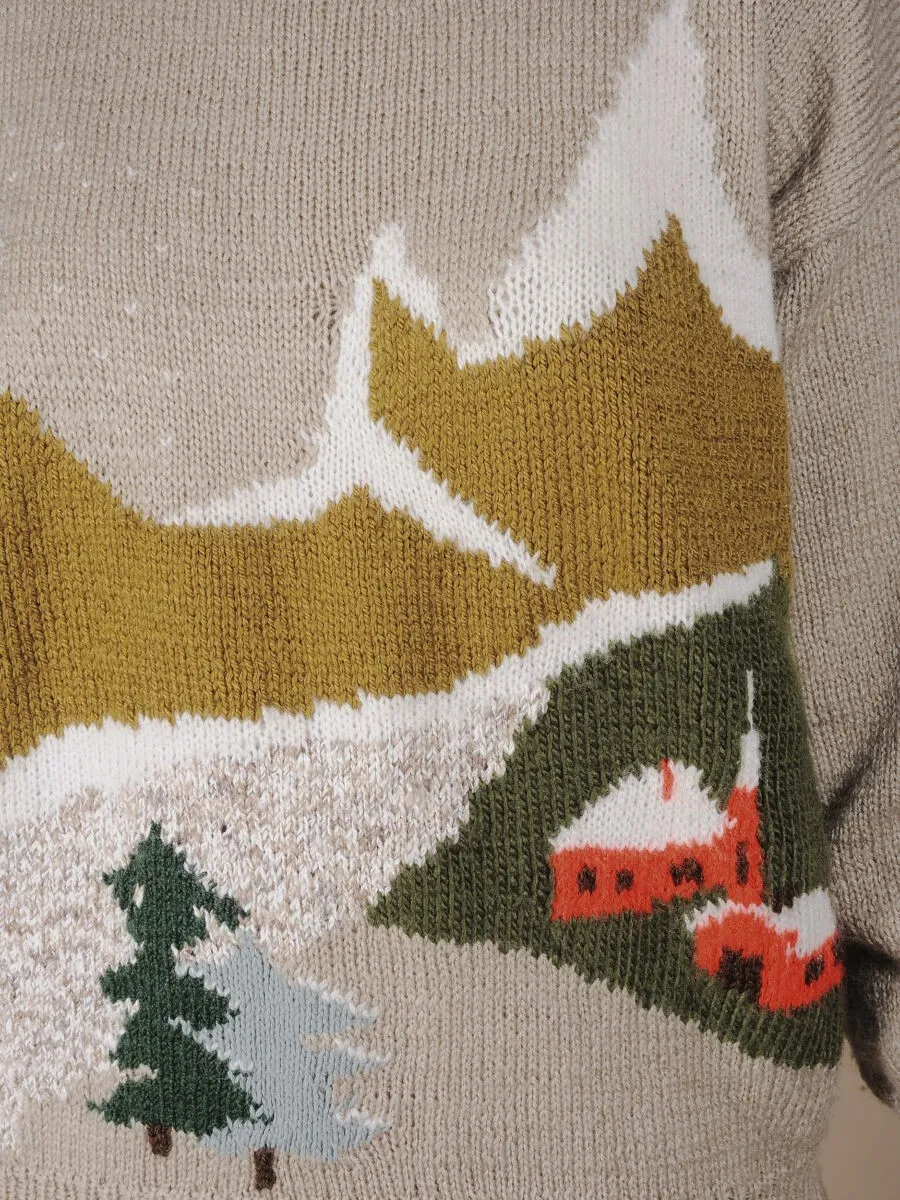 Maglione in lana con paesaggio di montagna